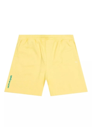 PUMA waffle-texture embroidered shorts - Yellow
