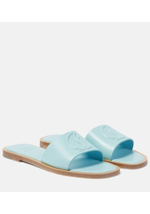 Christian Louboutin CL embossed leather mules