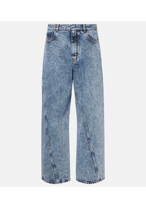 Alaia Twisted low-rise wide-leg jeans