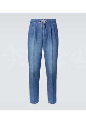 Brunello Cucinelli Faded tapered jeans