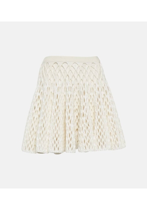 Alaia High-rise knit miniskirt