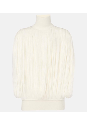 Alaia Fringed wool turtleneck sweater