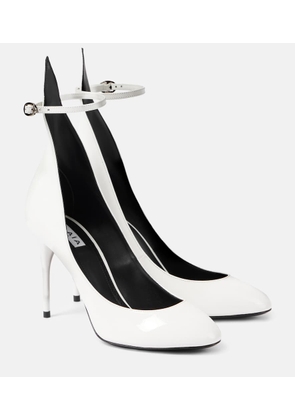 Alaia Decollete 90 patent leather pumps