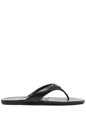 Prada enamel-triangle leather flip flops - Black