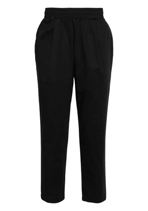 Family First pleat-detail tapered trousers - Blue
