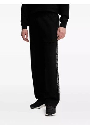 GUESS USA logo-detail track pants - Black