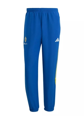 adidas three-stripe panel track pants - Blue