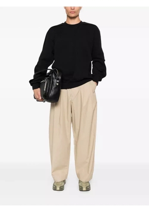 Studio Nicholson double-pleat trousers - Neutrals