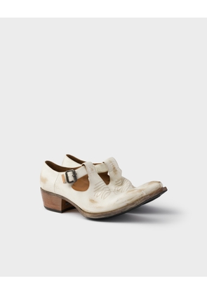 Antiqued leather shoes with buckle