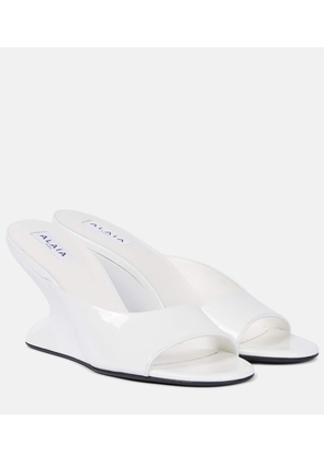 Alaia Curve 75 patent leather wedges