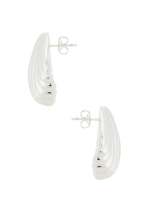 ANNI LU Silver Shell Earring in Metallic Silver.