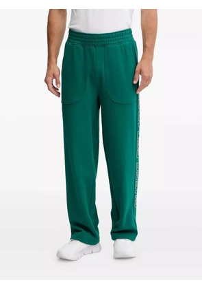 GUESS USA logo-detail panelled trousers - Green