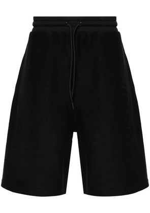 Moncler logo-embossed track shorts - Black