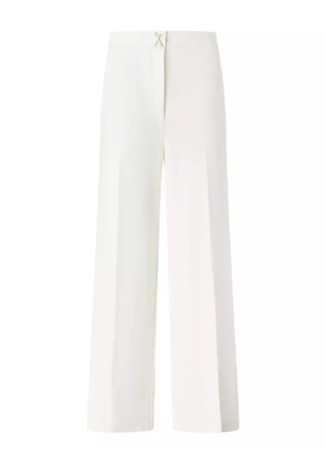 Genny cross-detail trousers - White