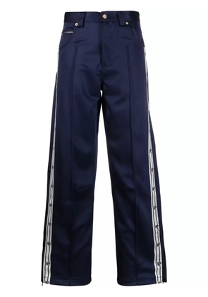 EYTYS Titan logo-tape trousers - Blue