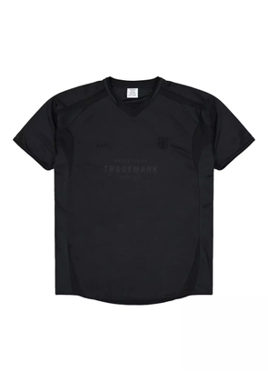 VETEMENTS Trademark Football V-neck panelled jersey - Black