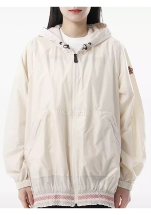 Moncler Grenoble embellished-hem raincoat - Neutrals