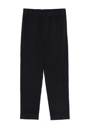 Homme Plissé Issey Miyake plissé elasticated trousers - Blue
