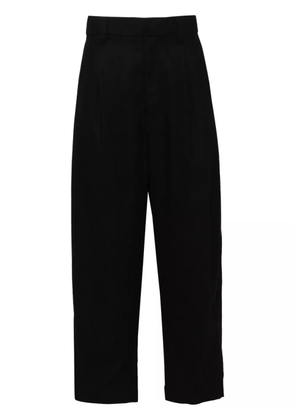 Facetasm pleated tapered trousers - Black