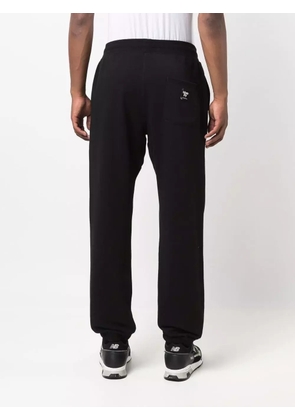 More Joy logo-embroidered track pants - Black