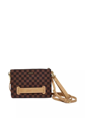 Sprayground Hennyville shark-checkered clutch bag - Brown