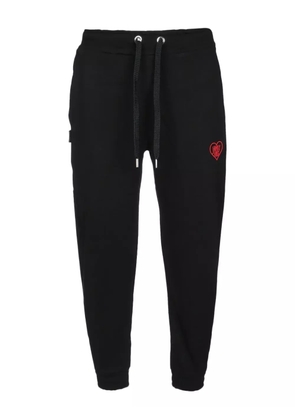 Family First heart-embroidered track pants - Black