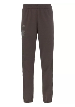 adidas burgundy Calabasas stripe print sweat pants - Brown