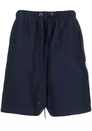 Advisory Board Crystals drawstring track shorts - Blue