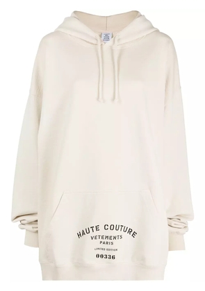 VETEMENTS slogan-print drawstring hoodie - White