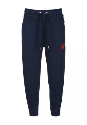 Family First heart-embroidered track pants - Blue
