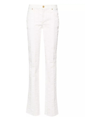 Blumarine raw-cut detailed slim-leg trousers - White