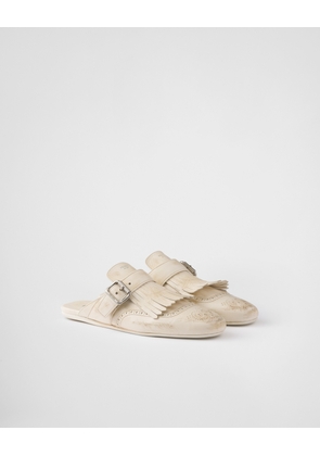 Shuffle fringed leather mules