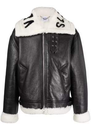 VETEMENTS logo-collar lambskin jacket - Black