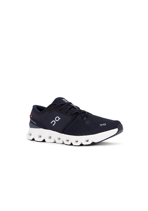 On Cloud X 4 Sneaker in Navy. Size 10. Also in 10.5, 11, 11.5, 12, 12.5, 13, 7, 7.5, 8, 8.5, 9, 9.5.