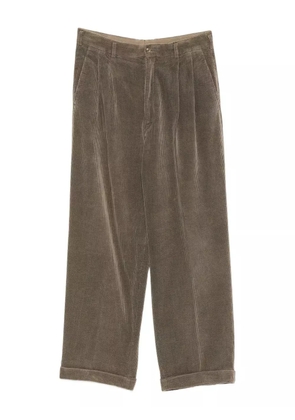 Comme Des Garçons Pre-Owned 1990s pleated corduroy trousers - Brown