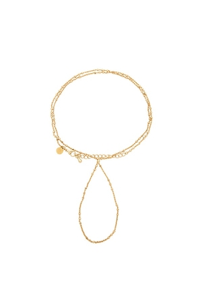 petit moments Dainty Hand Chain in Metallic Gold.