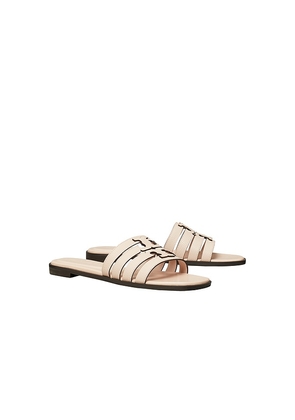 Tory Burch Ines Cage Slide in Nude. Size 10. Also in 10.5, 11, 5, 5.5, 6, 6.5, 7, 7.5, 8, 8.5, 9, 9.5.