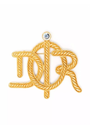 Christian Dior Pre-Owned 2010s pre-owned interlocking logo brooch - Gold