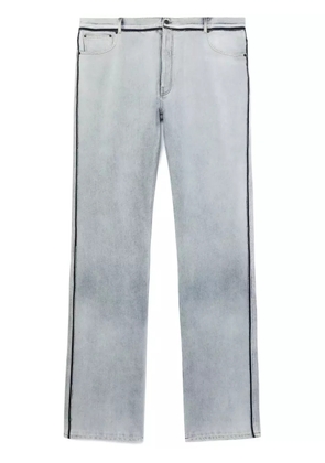 Maison Margiela contrasting-border straight-leg trousers - Blue