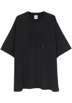 VETEMENTS slogan-embroidered T-shirt - Grey