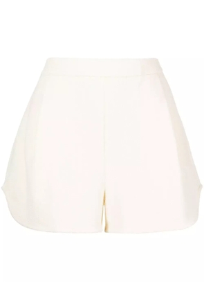 GOODIOUS pleat-detail cloqué shorts - Yellow