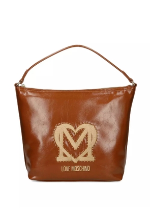 Love Moschino logo-plaque studded shoulder bag - Brown