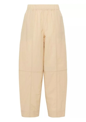 GANNI Curve tapered-leg trousers - Neutrals