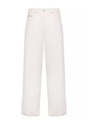 Moschino logo-plaque jeans - White