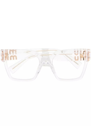 Miu Miu Eyewear logo-plaque transparent glasses - Neutrals