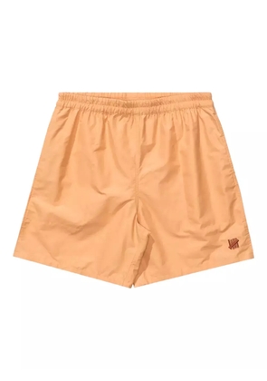 Undefeated logo-embroidered swim shorts - Brown