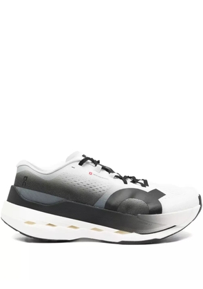 On Running Cloudboom logo-print sneakers - White