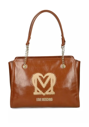 Love Moschino logo-plaque studded shoulder bag - Brown