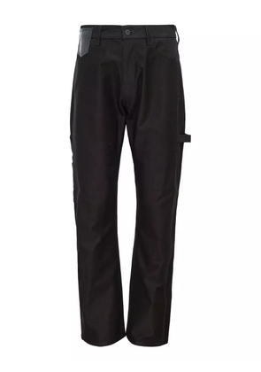 Junya Watanabe MAN leather-patch cotton trousers - Black