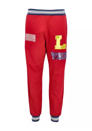 Moschino Pre-Owned logo-patch track pants - Red